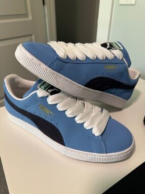 Puma Kids Suede Sneaker in Sky Blue and Black with White Laces